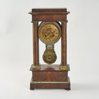 An Antique Portico Wood Mantle Clock