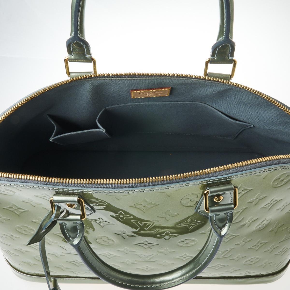 Sold at Auction: LOUIS VUITTON VERNIS HOUSTON LEATHER BAG; feature