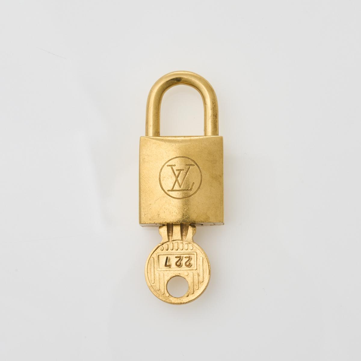 Sold at Auction: Louis Vuitton, LOUIS VUITTON PadLock Lock Key