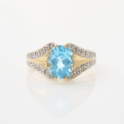 14ct Yellow Gold, 2.15ct Blue Topaz and Diamond Ring