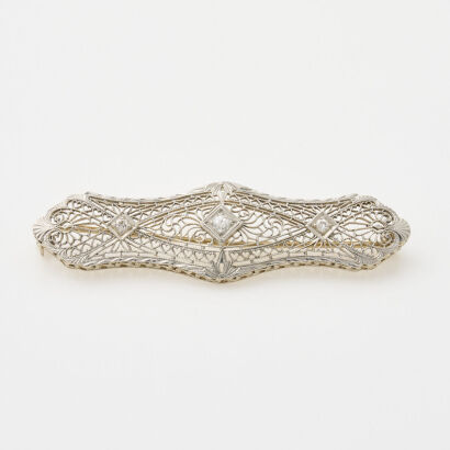 14ct White Gold, Diamond Brooch of .12ct Total