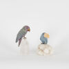 Two Carved Stone Birds on Quartz Perches