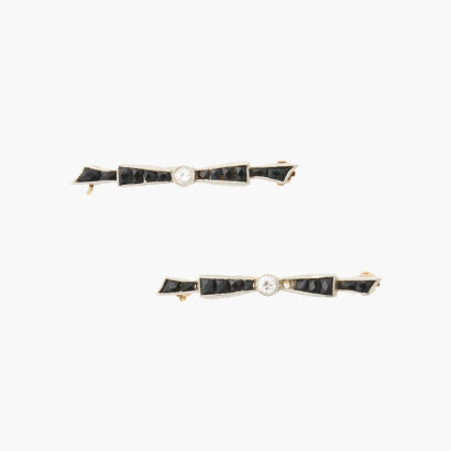 Platinum Antique Onyx and Diamond Brooch Pair