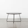 A Contemporary Round Coffee Table in Black with Metal Base