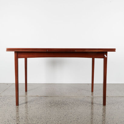 A Mid-Century Mahogany Extendable Dining Table