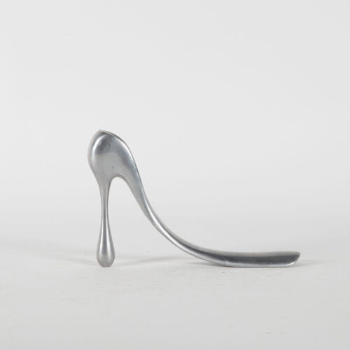 A Manolo Blahnik Limited Edition Cast Aluminium Shoe Horn, English C.2004