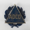 A Metal Adco Wall Plaque