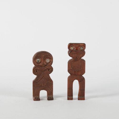 A Pair Of Souvenirware Tekotekos