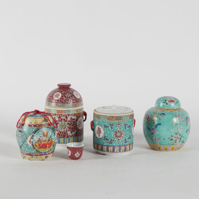 A Collection Of Four Famille Rose Ginger Jars