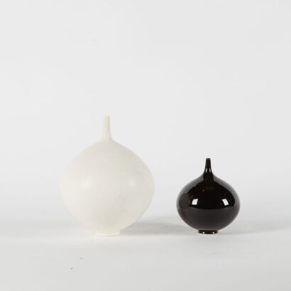 A Pair Of Peter Collis Orb Vases