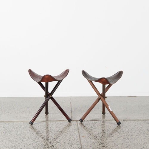 A Pair Of Mid-Century Maori Leather Worked Collapsible Tripod Stools