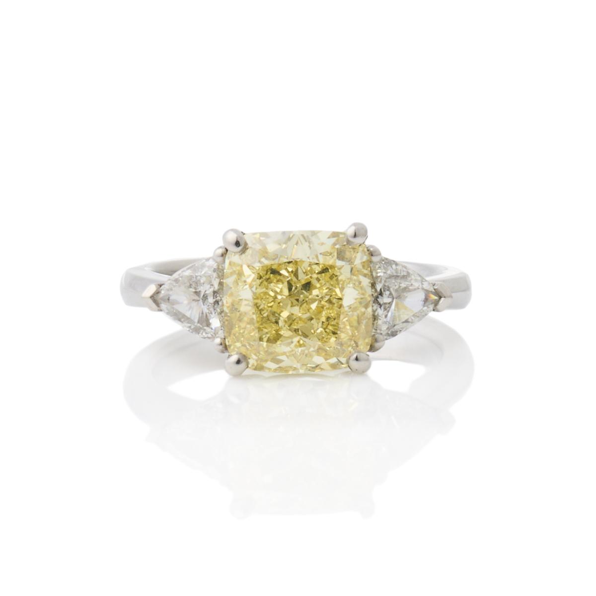 Platinum, 4.07ct Fancy Intense Yellow Diamond and White Diamond Ring