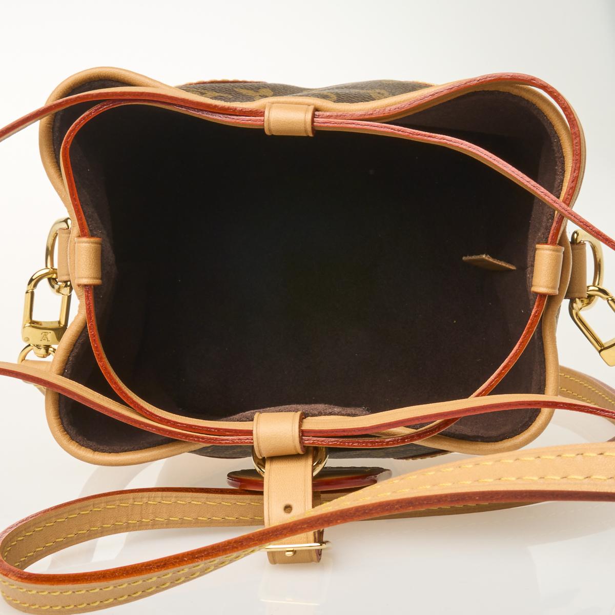 Sold at Auction: Louis Vuitton, LOUIS VUITTON 'MINI NOE' BROWN MONOGRAM  BUCKET BAG