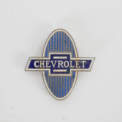 A Vintage Chevrolet Bowtie Car Badge