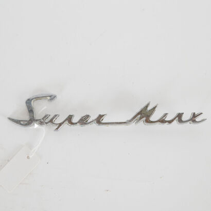 A Vintage Hillman Super Minx Car Badge