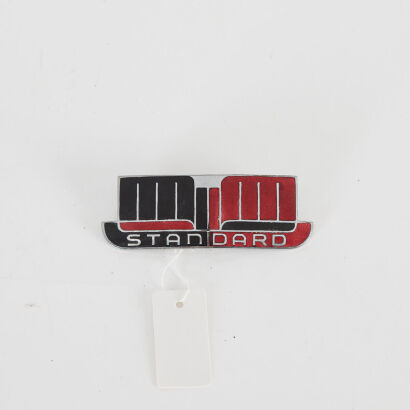 A Vintage Standard Car Badge