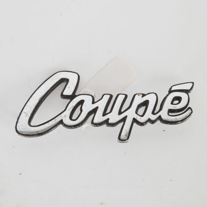 A Vintage 'Coupe' Car Badge