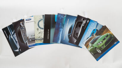 A lot of 10 Ford Sales Brochures