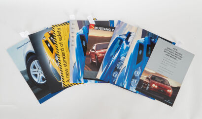 A lot of 10 Ford Sales Brochures