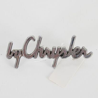 A Vintage "By Chrysler" Car Badge