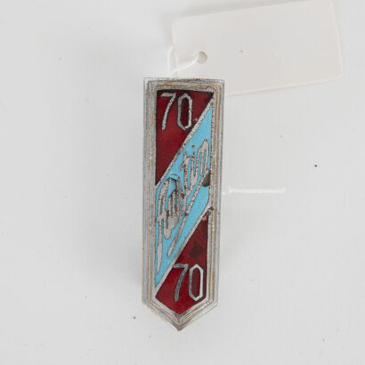 A Vintage Austin 70 Car Badge