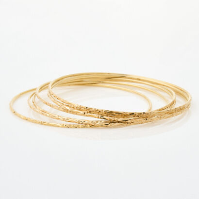 18ct Yellow Gold, Set of 7x Textured Bangles