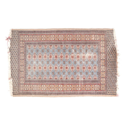 A Hand-Knotted Turkoman Rug