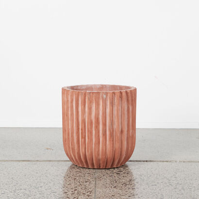 A Small Planter In Terracotta