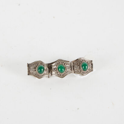 A Vintage Ethic Silver Bracelet With Green Stones