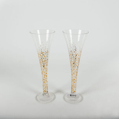 A Pair Of Gold Spotted Champagne Glasses