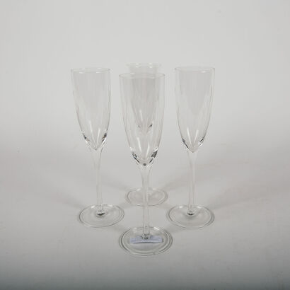 A Set Of Four Crystal Champagne Glasses