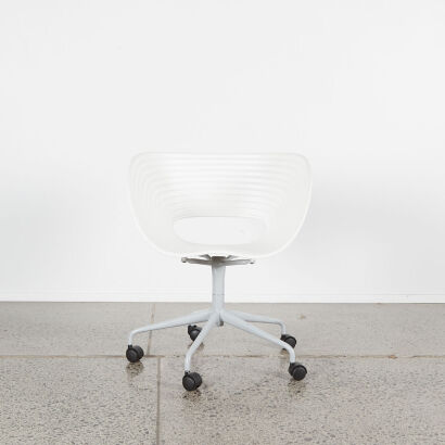 A Tom Vac Shell Chair By Vitra