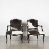 A Pair Of Louis Black Lacquer And Cow Hide Occasional Chairs
