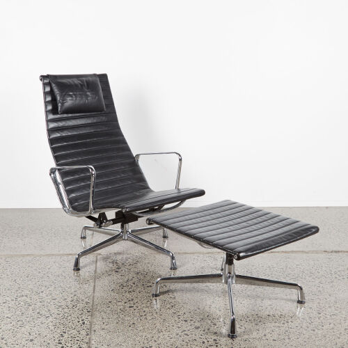 An EA124 'Aluminium Group' Lounge Chair & Ottoman By Charles & Ray Eames For Vitra