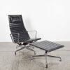 An EA124 'Aluminium Group' Lounge Chair & Ottoman By Charles & Ray Eames For Vitra
