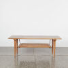 A Mid-Century Coffee Table With A Ratan Magazine Shelf