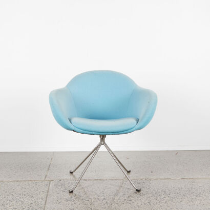 A Modern Design Tub Chair In Blue Upholstery And Stainless Base