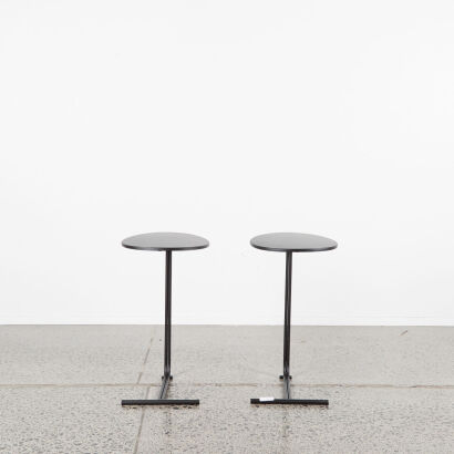 A Pair Of Black Metal Side Tables