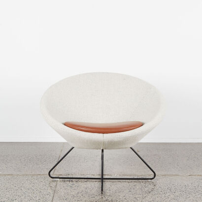 An MCM Style Tub Chair With Woven Upholstery And Atomic Style Base