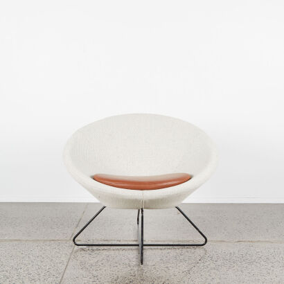 An MCM Style Tub Chair With Woven Upholstery And Atomic Style Base