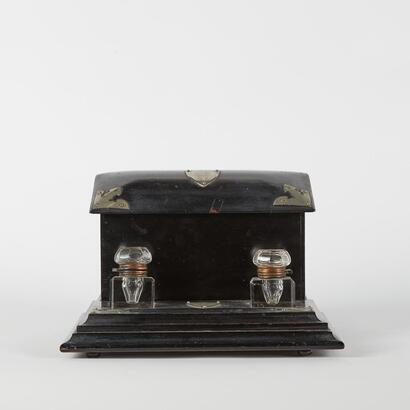 A Black Antique Writing Desk Set With Ink Wells