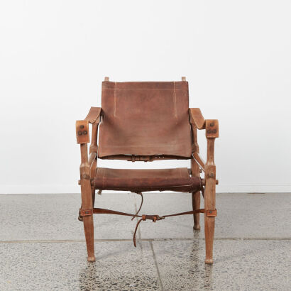 A Vintage Safari Chair Leather