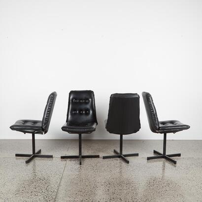 A Set Of Four Mid-Century Dining Chairs
