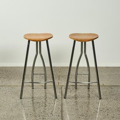 A Pair Of Stools With A Ply Top