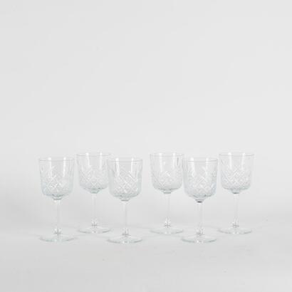 A Set Of Six Cut Glass Patterned Wine Glasses