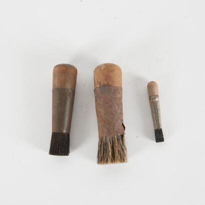 A Collection Of Three Vintage Brushes