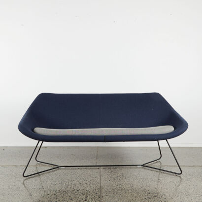 A Two Seater MCM Couch In Blue Fabric With Atomic Style Base