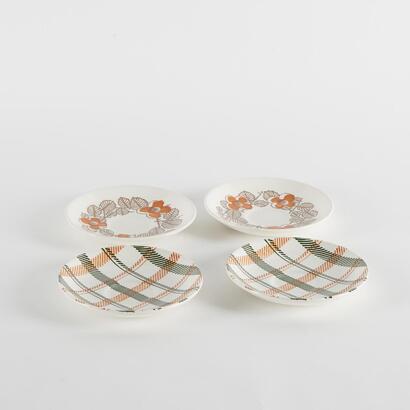 A Collection Of Four Vintage Crown Lynn Saucers