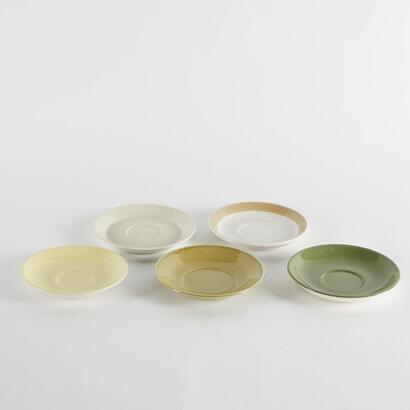 A Collection Of Five Crown Lynn Saucers
