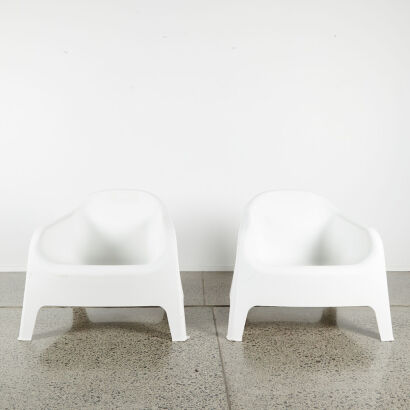 A Pair Of White Ergo Outdoor Chairs